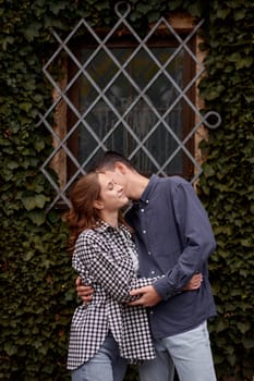 Young Cute Female Hugs Boyfriend. In Autumn Outdoor. Lovers Walking in Park. Attractive Funny Couple. Lovestory in Forest. Man and Woman. Cute Lovers in the Park. Family Concept. Happy Couple.