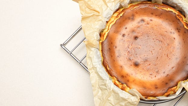 Delicious Cheesecake With caramel Crust And Creamy Filling Baked To Perfection standing on baking rack.