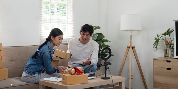 The duo engages in a strategic discussion about their upcoming online event, showcasing their passion for entrepreneurship and creating a friendly and energetic work environment.
