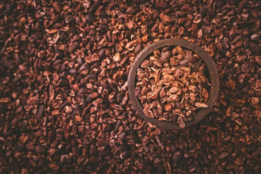 Organic cacao nibs in small bowl