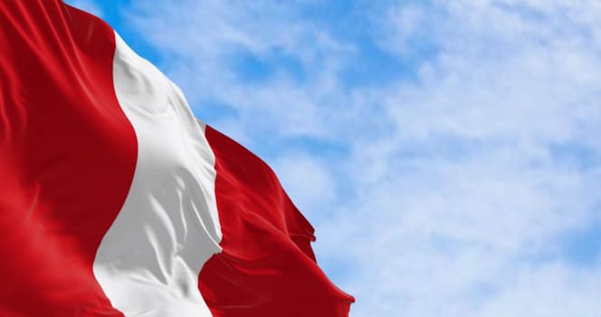 Close-up view of the Peru national flag waving in the wind. The Republic of Peru is a country in western South America. 3d illustration render. Fluttering fabric