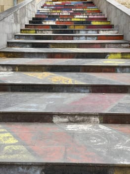 colored steps of the stone staircase to the top