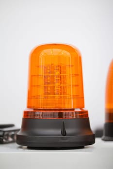 Orange flasher stand alone in exhibition - vertical