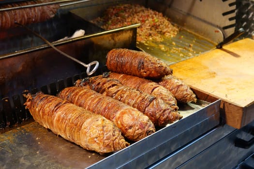 Grilled Lamb Offal Street Food Displayed on a Hot Grill for Cooking.