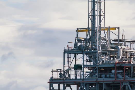 Part of oil installation at sea - platform for production oil and gas - telephoto shot
