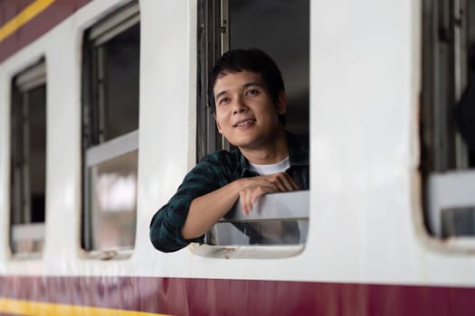 A traveler rests by the train window, enjoying the scenery flowing past while embodying a peaceful journey of self-discovery and wanderlust.