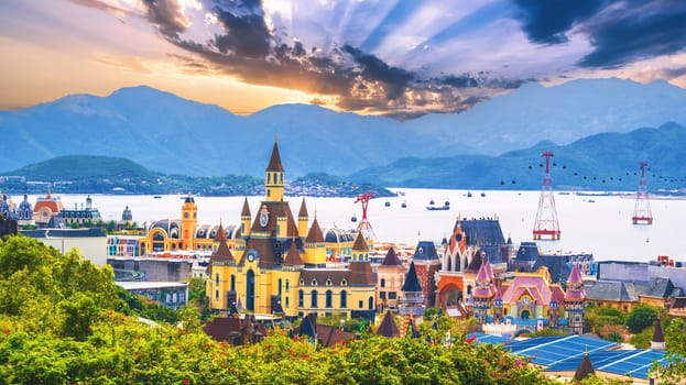 Beautiful panoramic landscape of Vinpearl Island Amusement Park with fantastic castles and cable car in Nha Trang, Vietnam at sunset