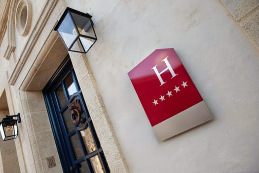 Five stars hotel sign on a facade