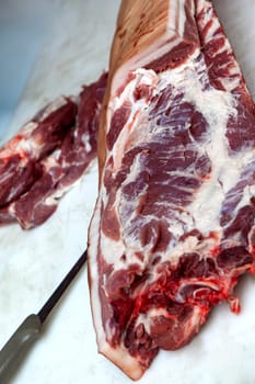 Half a pig on the butcher stall