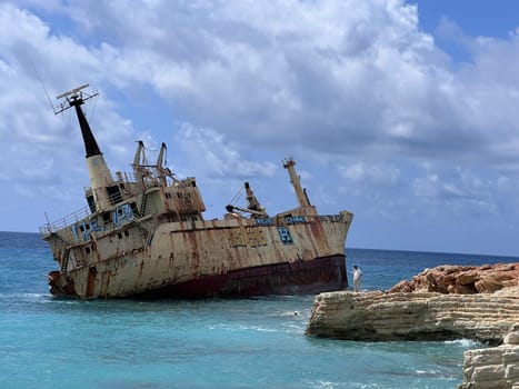 Abandoned Edro III Shipwreck at seashore of Peyia, near Paphos, Cyprus. Historic Edro III Shipwreck site on the shore of the water in Cyprus. Aerial view of Shipwreck EDRO III, Pegeia, Paphos. High quality photo