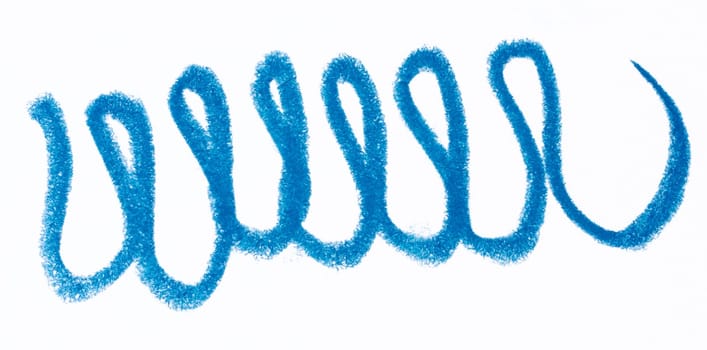 Scribbles drawn with blue pencil on white background