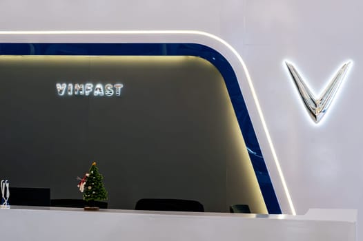 Logo of Vietnamese brand of Vinfast electric cars manufactured by Vingroup at automobile exhibition in Vietnam. Nha Trang, Vietnam - April 01, 2025