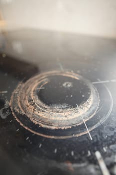 closeup of dirty electric stove ,