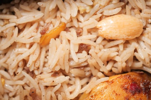 Aromatic rice combines with tender meat and nuts for a rich flavor.