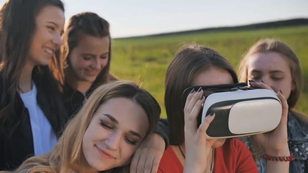 Fun school friends alternately wear virtual glasses
