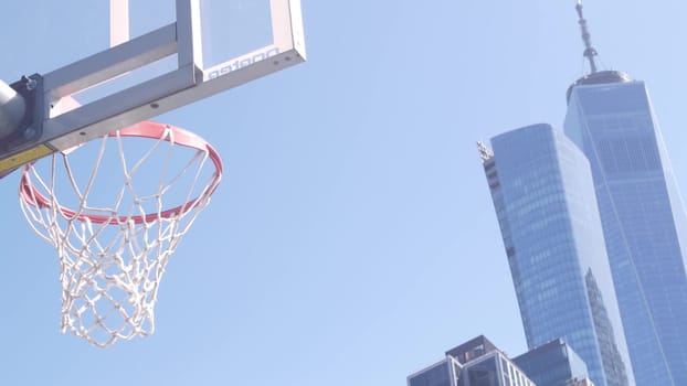 New York City, United States - 31 Aug 2023: World Trade Center, Manhattan Downtown Financial district USA. Hudson River Park basketball court. Basket ball hoop and blackboard. Outdoor streetball sport