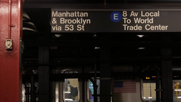 New York, United States, 31 Aug 2023: Subway station interior, underground metropolitan platform sign. Metro train, railway passenger public transport. Text signboard Manhattan, Brooklyn. Court Square
