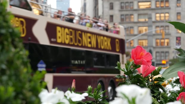 New York City, United States - 6 Sept 2023: Manhattan Midtown Broadway, 23 street, 5 avenue crossroad intersection. Worth Square near Madison Park, Flatiron, USA. People on Big Bus tour, yellow taxi.
