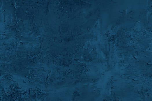 Abstract decorative dark blue plaster wall background