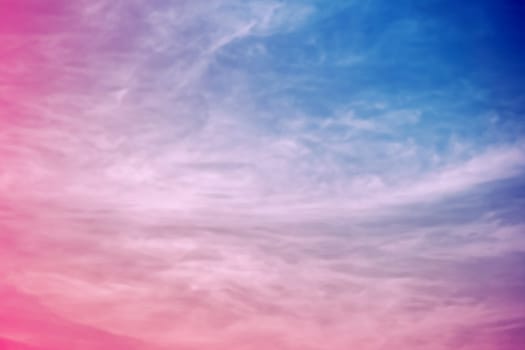 blue sky and soft clouds processed with a color filter. abstract nature background