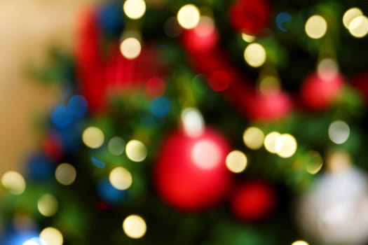 decorated christmas tree on blurred background. christmas background