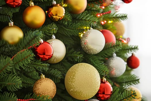 decorated christmas tree on blurred background. christmas background
