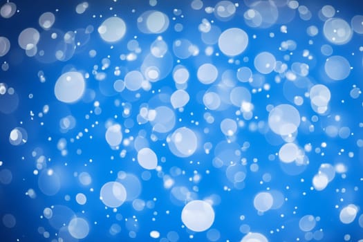 bokeh winter background. blue bokeh lights abstract background