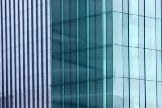 blurred abstract grey glass wall from building background. abstract architectural theme