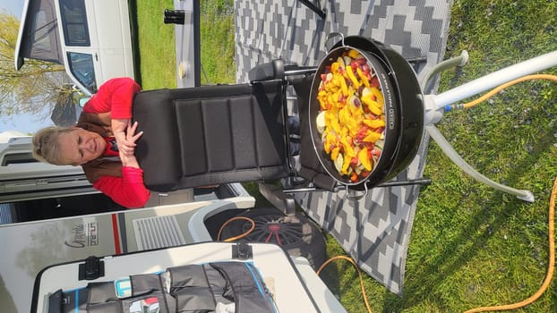 ZELADE, NETHERLANDS - APRIL30, 2023: Zelande, The Netherlands - April 30, 2023: Campers parked on a Camer Van pitch. Concept camper van leisure and fun