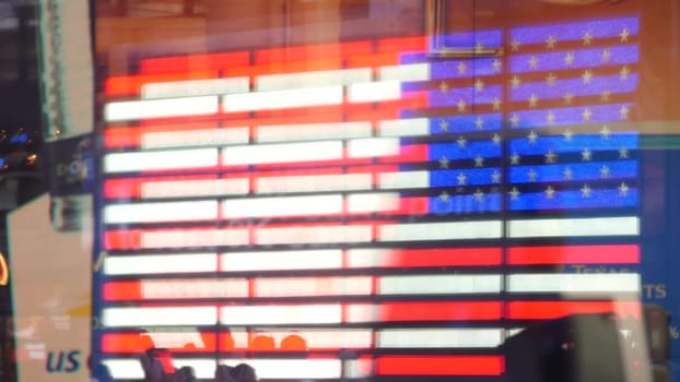 New York City, United States - 5 Sept 2023: Times Square, Manhattan Midtown Broadway street, USA. American flag, NYC urban life. Military island, army recruiting. People pedestrians silhouettes, crowd