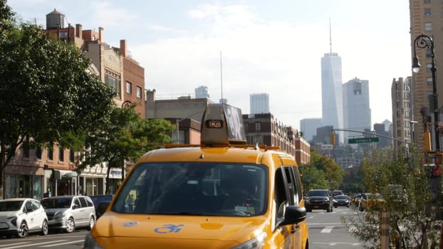 New York City, United States - 10 Sept 2023: Manhattan Greenwich Village street, Sixth 6 Americas avenue crossroad. Urban road car traffic in USA. People, zebra, yellow taxi cab. World trade center.