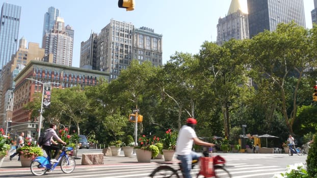 New York City, United States - 6 Sept 2023: Manhattan Midtown Broadway, 23 street, 5 avenue crossroad intersection. Worth Square near Madison Park and Flatiron Building, USA. People on zebra crosswalk