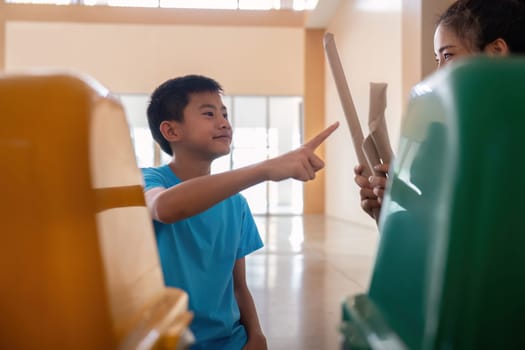 Two individuals share insights and practices surrounding waste separation and recycling, empowering environmental stewardship in their community.