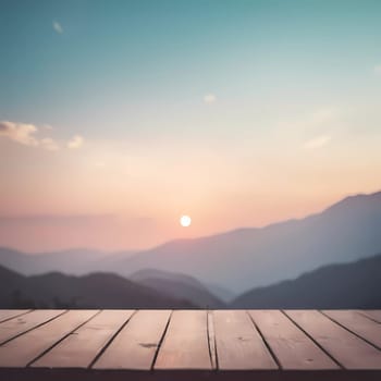Soft pastel colors blend seamlessly in the sky as the sun gently dips behind distant mountains, creating a peaceful atmosphere above a wooden surface waiting for creative inspiration.