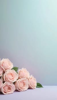 Delicate pink roses rest on a smooth surface, their soft petals and lush green leaves creating an inviting ambiance perfect for special messages or creative projects.