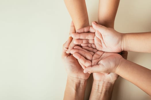 Family Day concept, Parents and kid hold empty hands top view isolated. Portraying togetherness support and generational legacy.