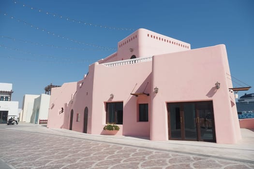 Qatar Doha 2 february 2025, Colorful architecture in desert town at mina district .