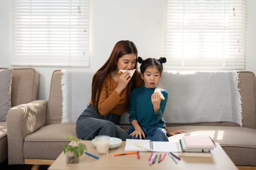 A mother and daughter are bonding over snacks before heading back to school. The cozy atmosphere is filled with laughter and excitement.