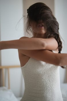 A tranquil and serene moment beautifully captured of a woman in an exquisite lace dress, radiating grace