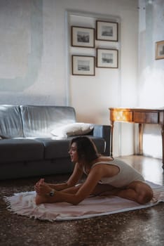 A peaceful indoor scene of a woman practicing yoga and mindfulness in a cozy, naturally lit living space