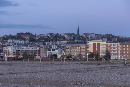Le Havre, France, February 26, 2025: Evening settles over Le Havre city waterfront promenade.