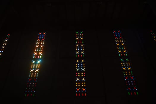 Le Havre, France, February 26 2025: Interior of St. Joseph s Church in Le Havre, showcasing Auguste Perret s modernist design with vibrant stained glass