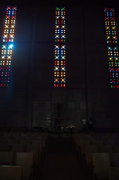 Le Havre, France, February 26 2025: Interior of St. Joseph s Church in Le Havre, showcasing Auguste Perret s modernist design with vibrant stained glass