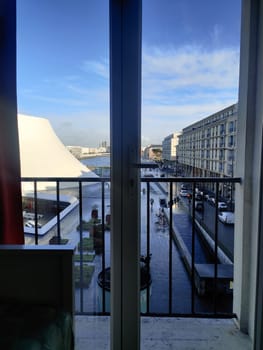 Le Havre, France, February 26, 2025: A window view of Le Havre featuring Oscar Niemeyer's Volcano, a bold and modern architectural landmark in Normandy, blending curves and concrete