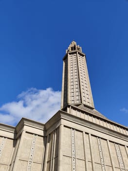 Le Havre, France, February 26 2025: Tower of St. Joseph Church in Le Havre, showcasing Auguste Perret modernist design with vibrant stained glass