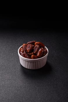 Dried tropical date fruit as an ingredient for fresh organic diet food. Vegan, vegetarian food