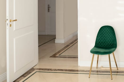 Clean modern waiting room in dental clinic with chairs