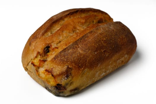 A beautifully baked loaf rests on a clean surface, showcasing its golden crust and inviting aroma. Perfect for sandwiches or enjoying with butter, it is an expression of culinary artistry.