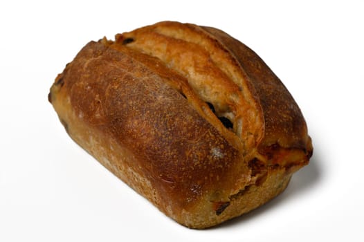 This artisanal bread loaf, golden brown with a crispy crust, sits on a clean surface. Its inviting aroma and soft interior beckon for a delightful tasting experience.