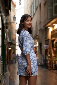 Beautiful young mixed race woman in the old town of Nice